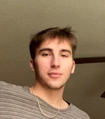 A picture of Enzo Sperduti smiling.